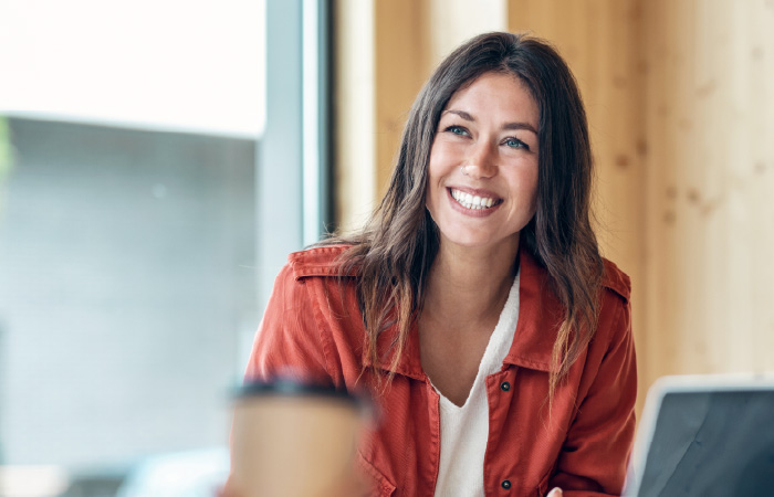 Photograph of a smiling revenue professional